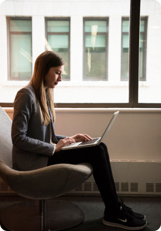 Girl Sitting with Laptop