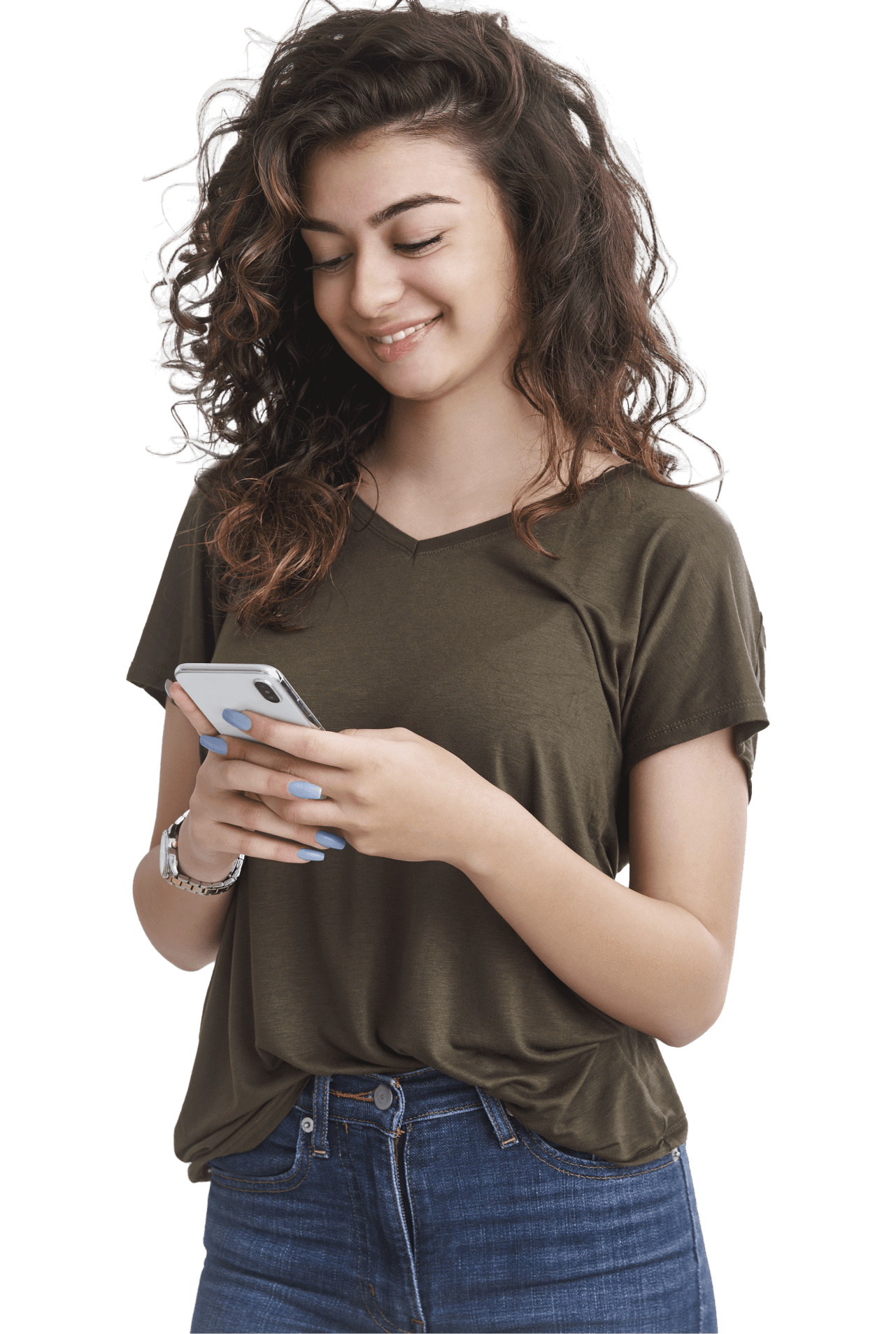 A beautiful girl with curly hair wearing green top smiling at her iphone screen 